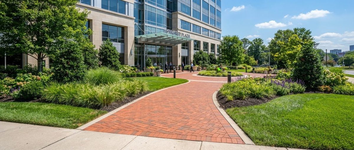 Landscaped brick walkway at a corporate plaza
