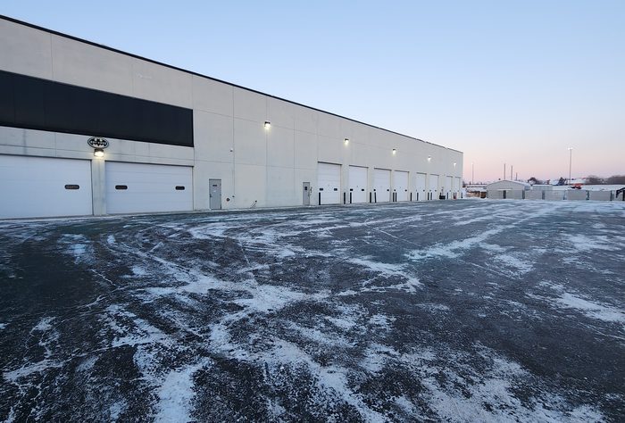 Cleared drive lane at an industrial facility