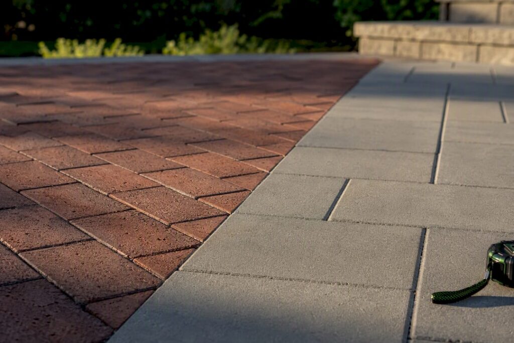 Brick and concrete pavers side by side